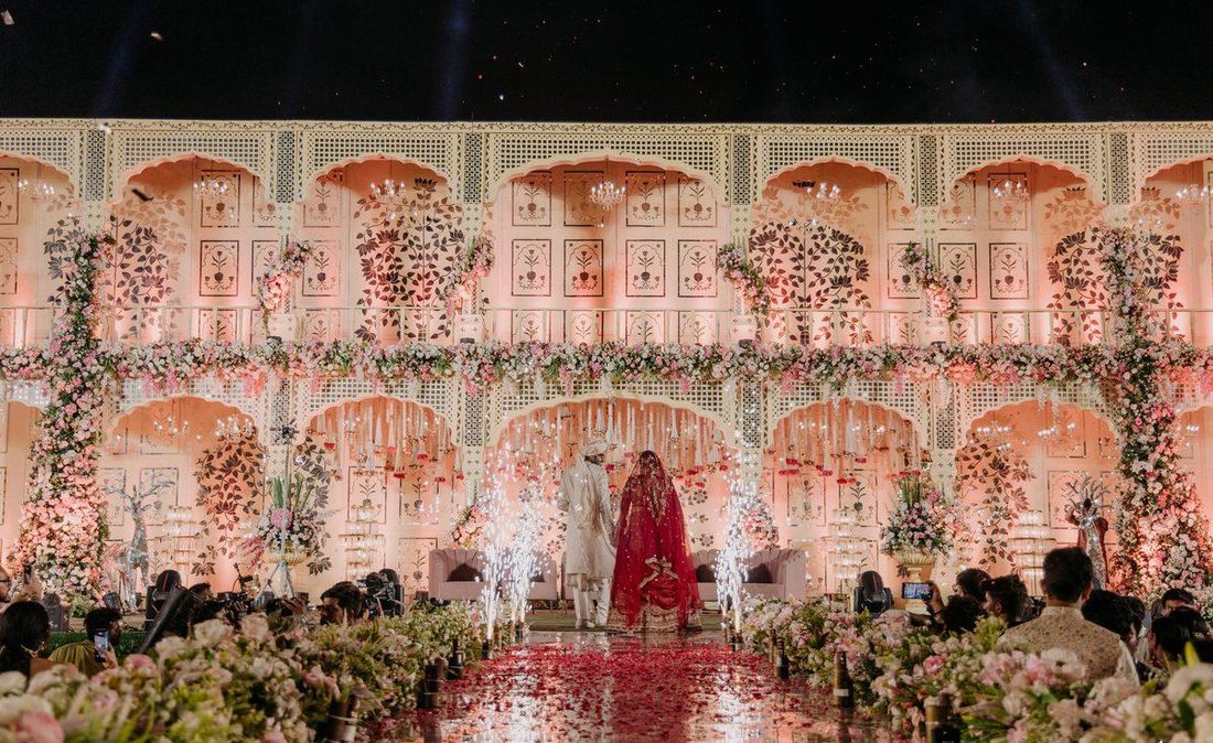 Night ceremony, couple on stage with sparklers