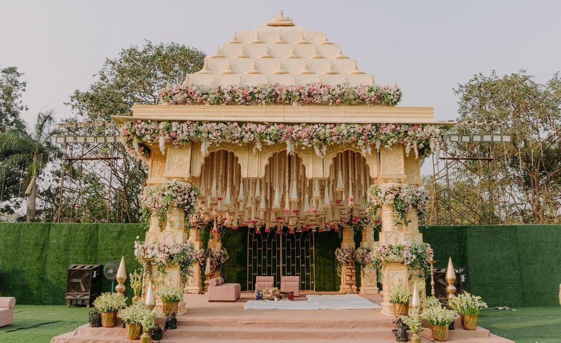 Mandap with gold and pink florals