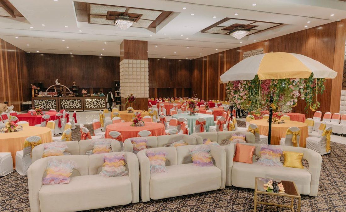 Sangeet and mehendi seating in pastel tones